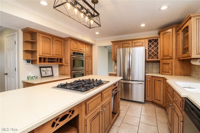 kitchen featuring crown molding, hanging light fixtures, decorative backsplash, light tile patterned floors, and appliances with stainless steel finishes