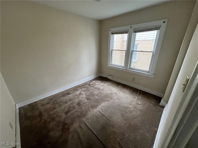 unfurnished room featuring carpet floors