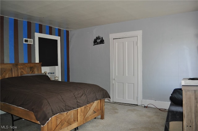 bedroom with light carpet