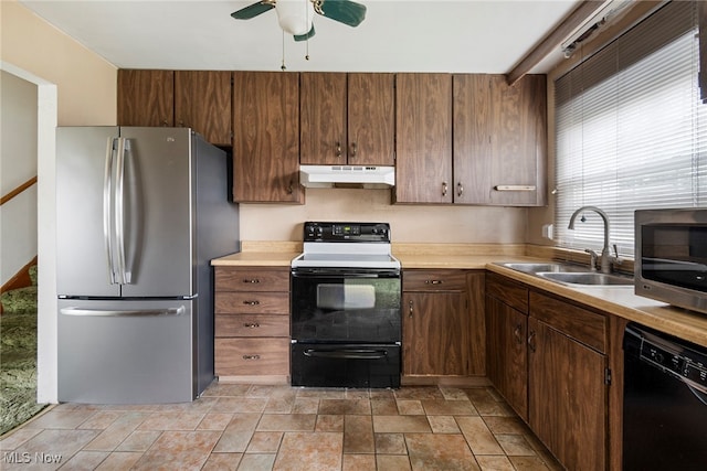 kitchen with black appliances, plenty of natural light, ceiling fan, and sink