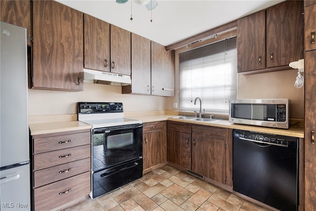 kitchen with sink, ceiling fan, and black appliances