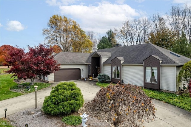 single story home featuring a garage