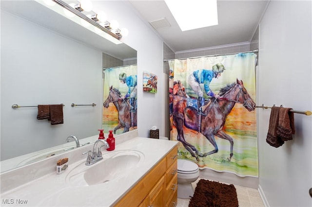 bathroom featuring a skylight, curtained shower, toilet, vanity, and ornamental molding