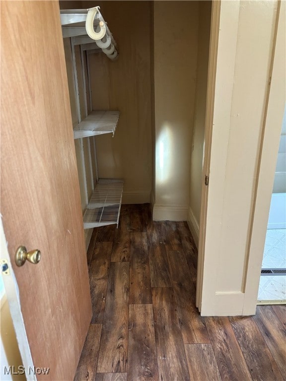 interior space featuring dark wood-type flooring