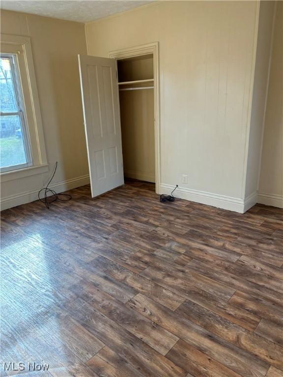 1013 Saint George, East Liverpool, OH 43920 - unfurnished bedroom featuring dark wood finished floors and a closet