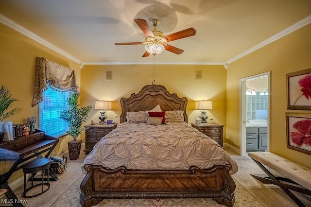 carpeted bedroom featuring visible vents, ensuite bathroom, ornamental molding, a ceiling fan, and baseboards