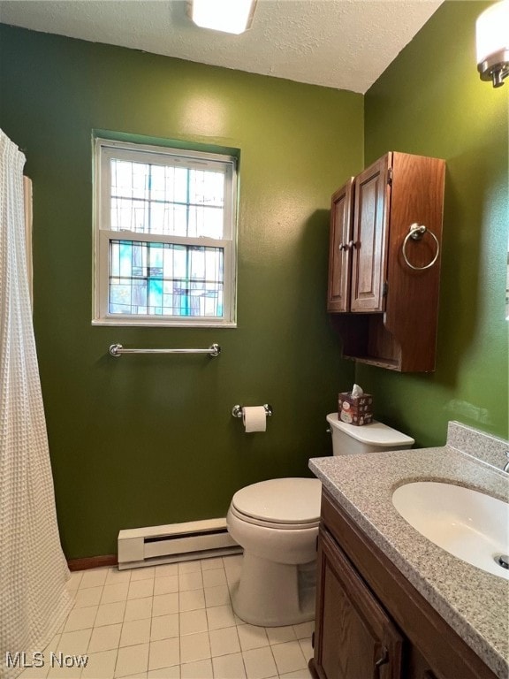 bathroom with vanity, a baseboard heating unit, tile patterned floors, toilet, and a textured ceiling