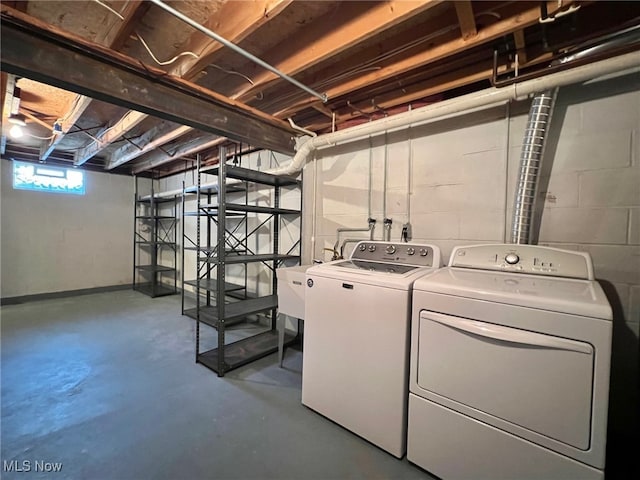 laundry room with independent washer and dryer