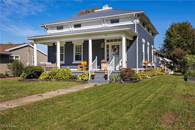 view of front of house featuring a porch and a front yard