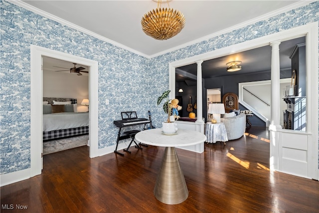 interior space featuring ceiling fan, ornamental molding, hardwood / wood-style floors, and ornate columns