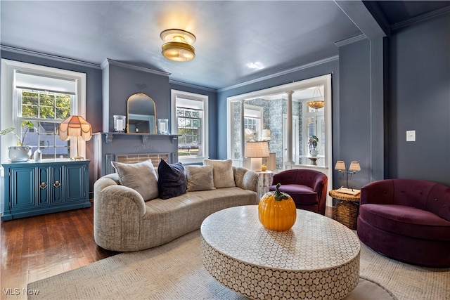 living room with crown molding and dark hardwood / wood-style floors