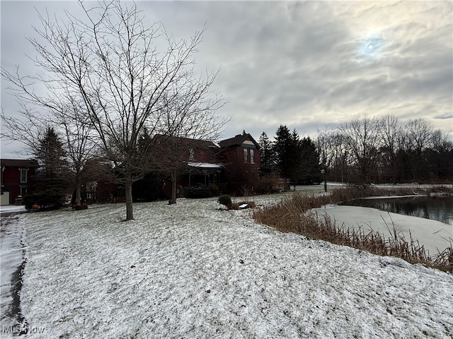 view of yard covered in snow