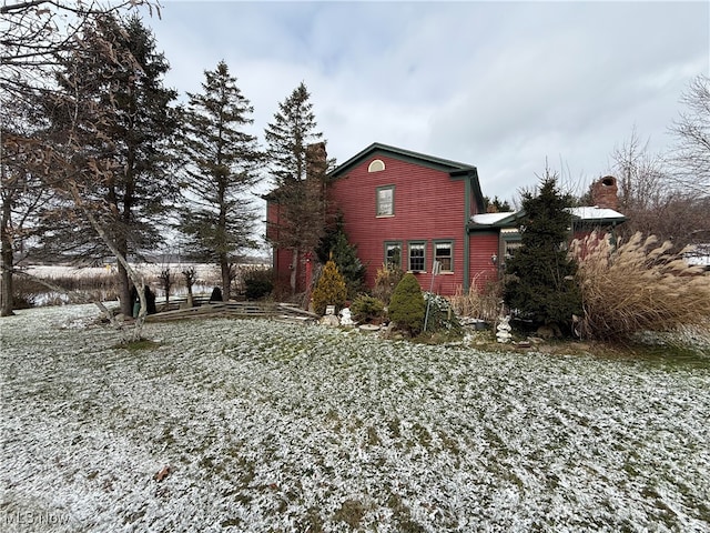 view of snow covered property