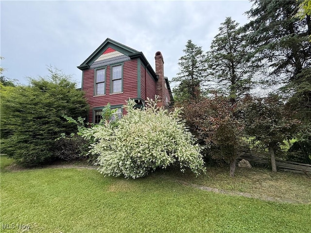 7917 Columbiana Canfield Rd, Canfield, OH 44406 - view of side of property featuring a yard and a chimney