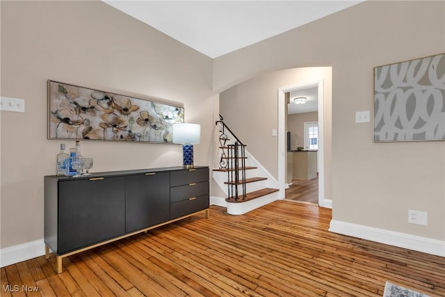 3781 Washington Blvd, University Heights, OH 44118 - foyer entrance with light wood finished floors, baseboards, and stairway
