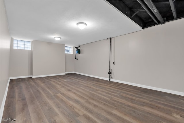 basement with wood-type flooring