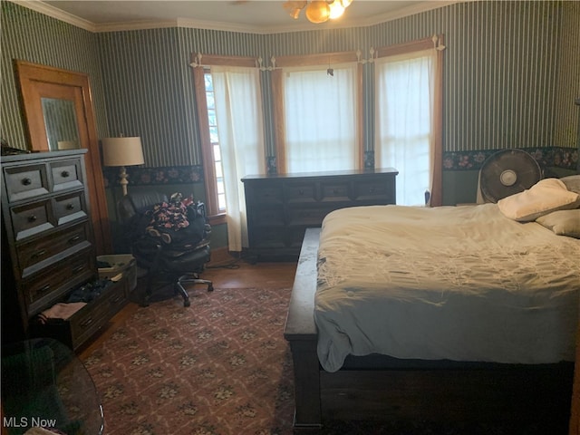 bedroom with crown molding