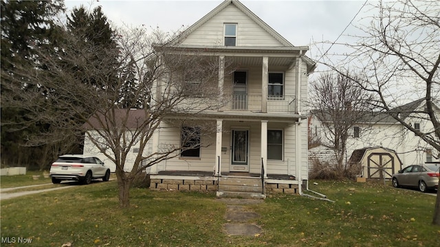 view of front of house featuring a porch and a front lawn