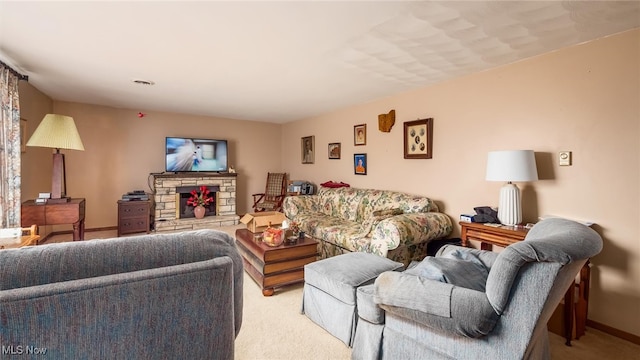 carpeted living room featuring a fireplace