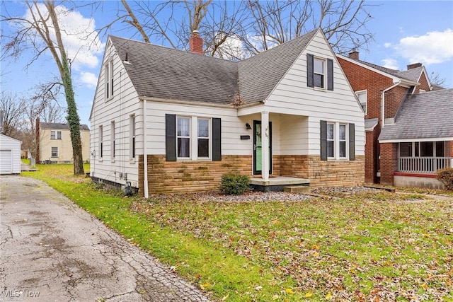 view of front of home with a front yard