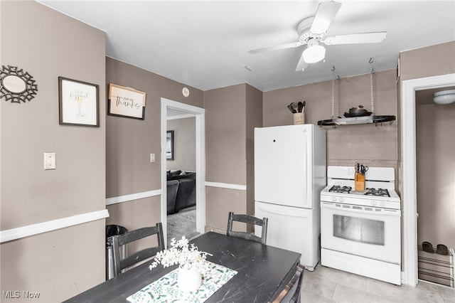 kitchen with ceiling fan and white appliances