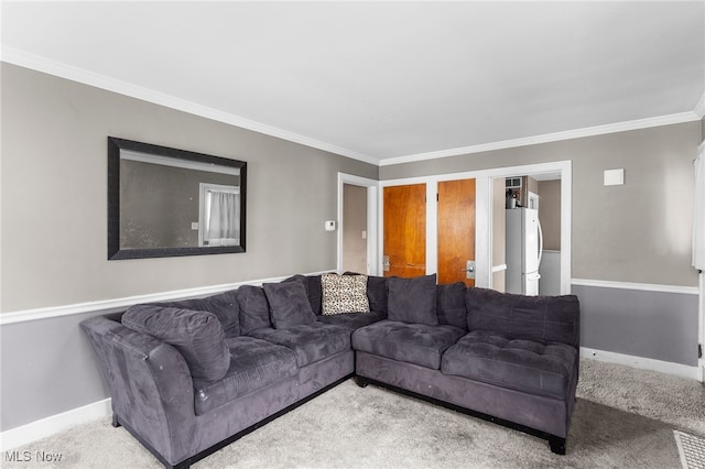 carpeted living room featuring ornamental molding