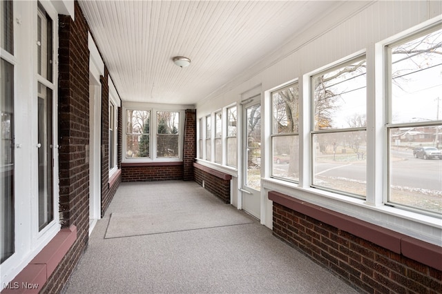 unfurnished sunroom with a healthy amount of sunlight