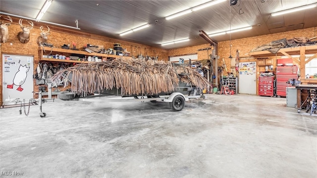 garage featuring a workshop area