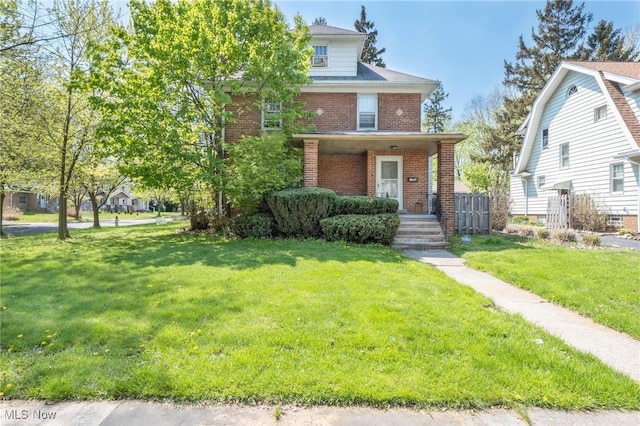 view of front of home featuring a front lawn