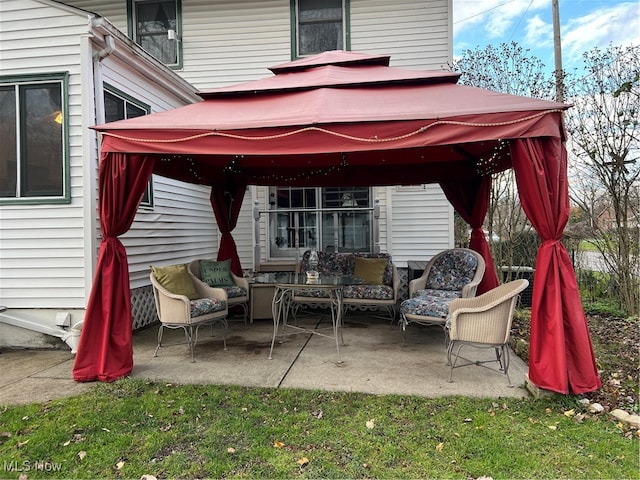 view of patio / terrace with a gazebo and outdoor lounge area