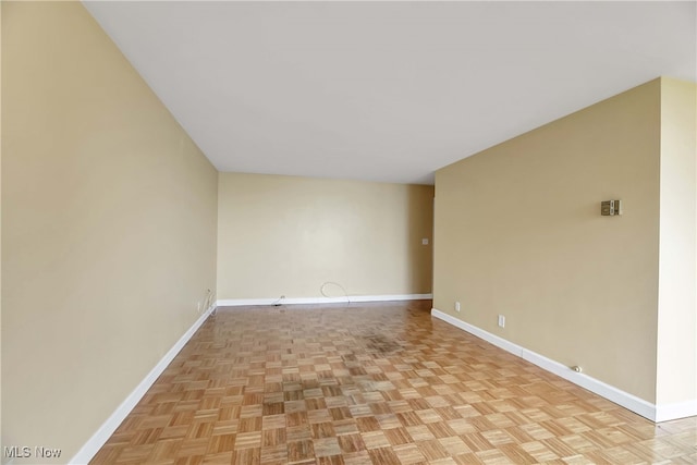 spare room featuring light parquet flooring