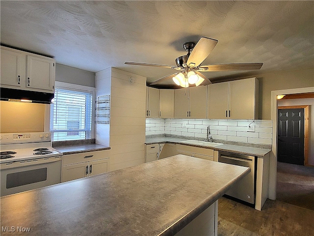 kitchen featuring dishwasher, sink, dark wood-type flooring, backsplash, and white range with electric cooktop