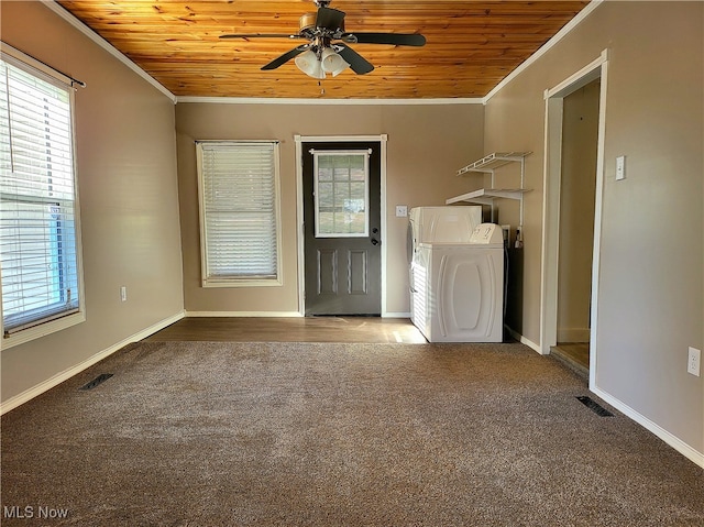 interior space featuring ceiling fan, wooden ceiling, ornamental molding, and washer / clothes dryer