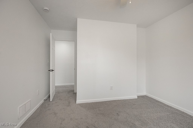 empty room featuring carpet