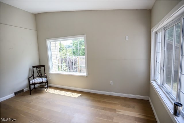 sitting room featuring light hardwood / wood-style floors