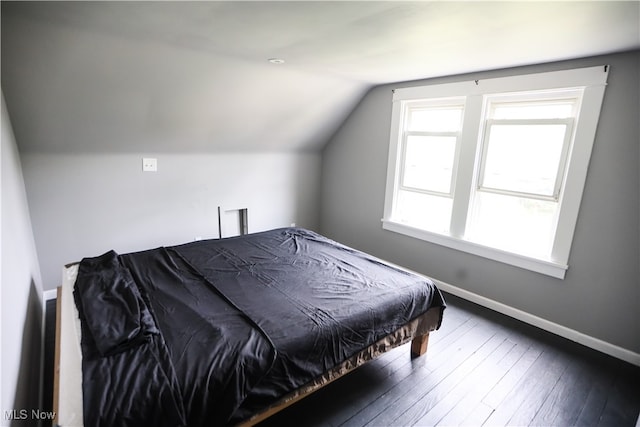 bedroom featuring dark hardwood / wood-style floors, pool table, and vaulted ceiling