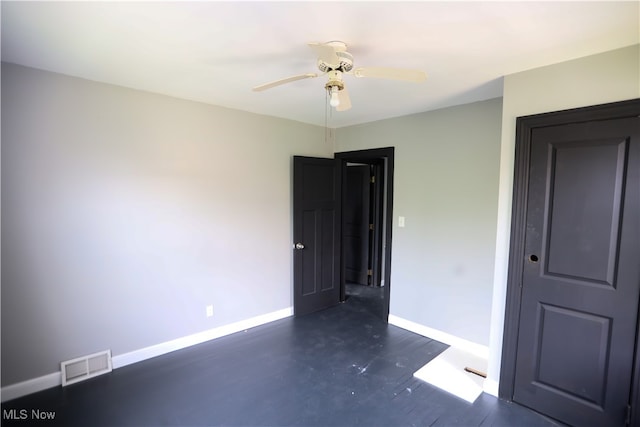 unfurnished bedroom with ceiling fan