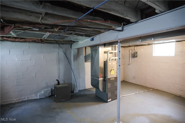 basement featuring heating unit