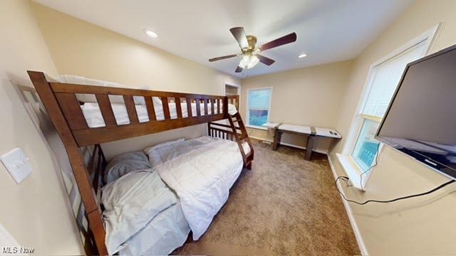 bedroom featuring carpet flooring and ceiling fan