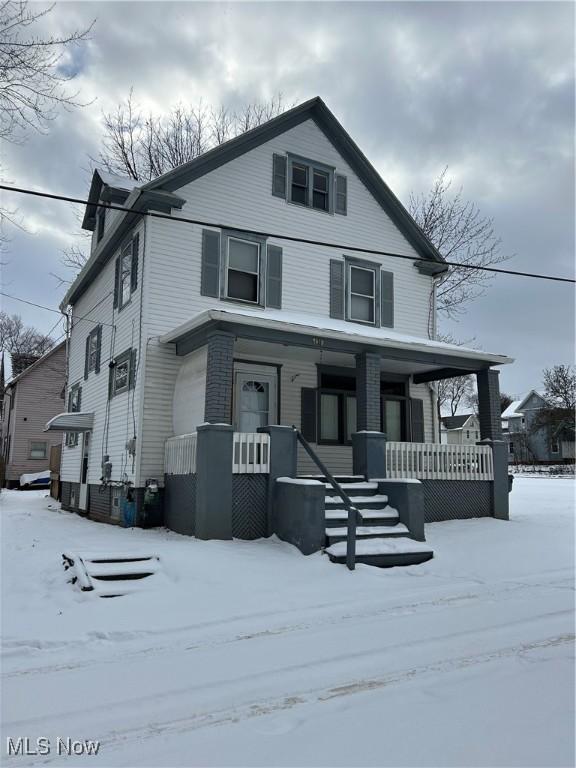 front facade featuring covered porch