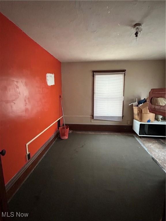 interior space featuring concrete flooring