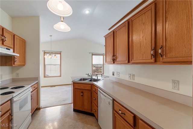 kitchen with pendant lighting, lofted ceiling, white appliances, sink, and a chandelier