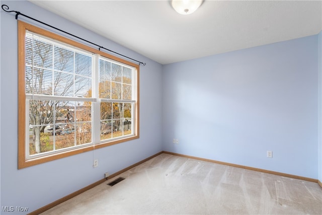 view of carpeted spare room