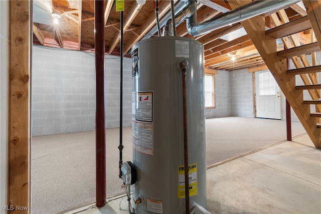 utility room featuring gas water heater