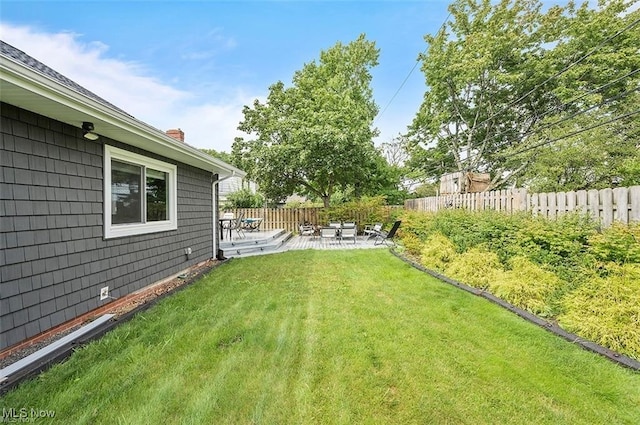 view of yard featuring a patio area