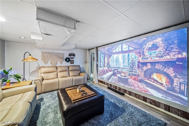 home theater room featuring wood-type flooring