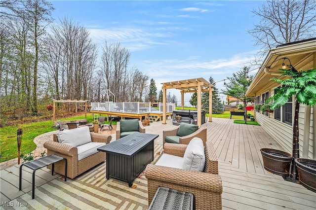 wooden deck with a pergola and an outdoor living space