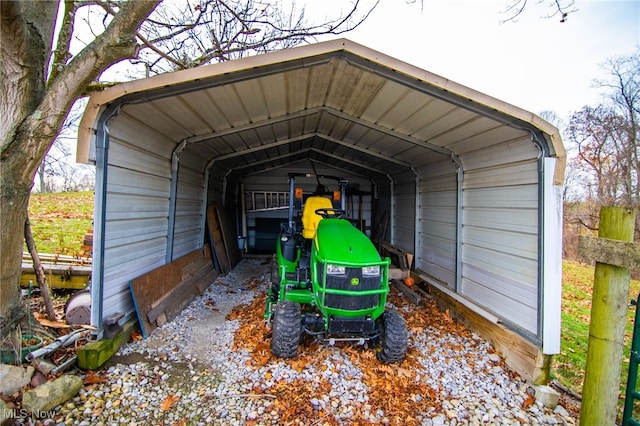 view of parking / parking lot featuring a carport