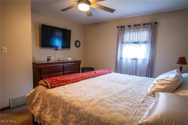 carpeted bedroom featuring ceiling fan