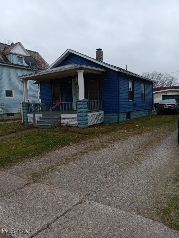 bungalow-style home with a porch